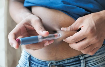 Yong Person Injecting Insulin