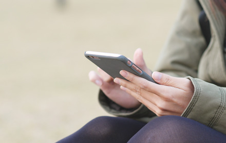 Woman Using A Mobile Phone