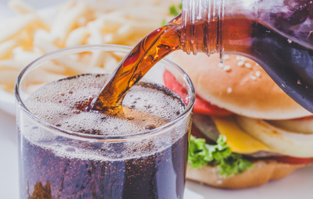 Soft Drink Cola Near Junk Foood