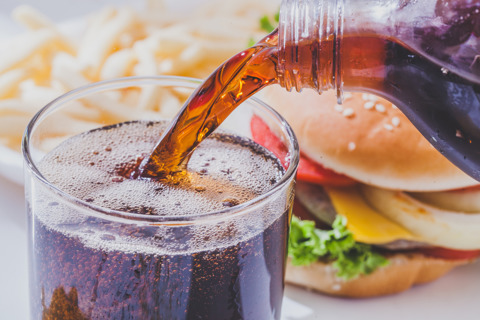 Soft Drink Cola Near Junk Foood
