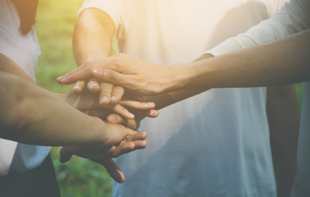 Teamwork Hands Together