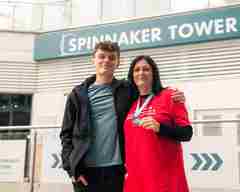 Our DRWF fundraiser, Jane, with her son Isaac outside the Spinnaker Tower. 