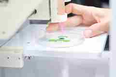 A 3D bioprinter in action. 