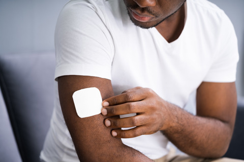 Applying Nicotine Drug Smoking Patch