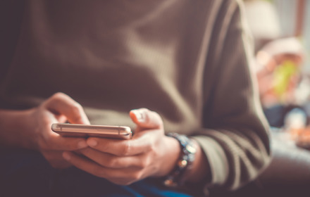 Person Using Smartphone