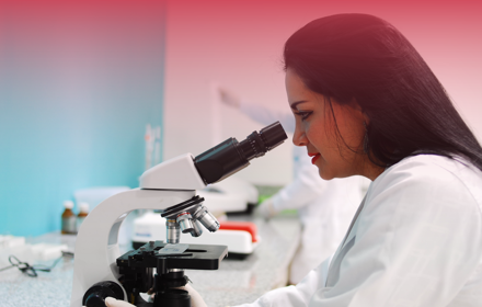 Woman Using A Microcospe