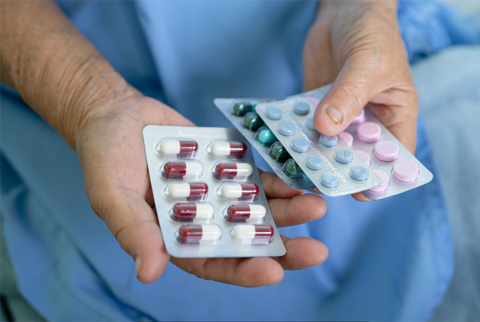 Medical Pills In Hand R
