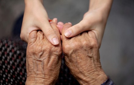 Elderly Care Holding Hands