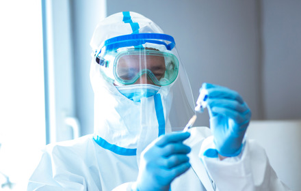 Doctors In COVID 19 Protective Clothing
