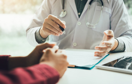 Doctor Talking To The Patient About Treatment