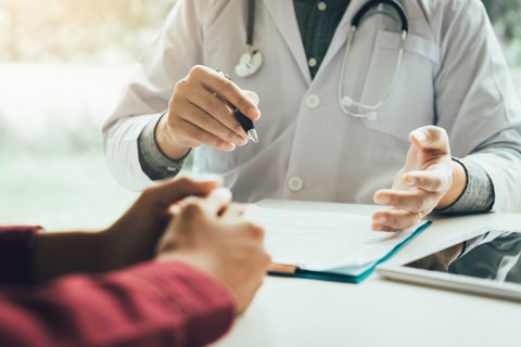 Doctor Talking To The Patient About Treatment
