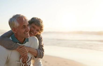 Elderly Couple At The Beach