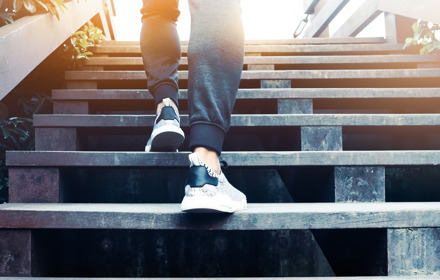 A Man Climbing Steps