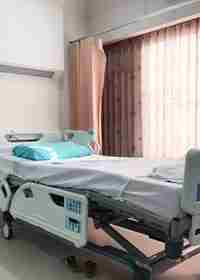 Empty Hospital Bed For Patient