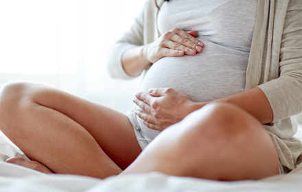 Pregnant Woman Sitting Down R