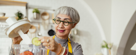 Woman Using Blender