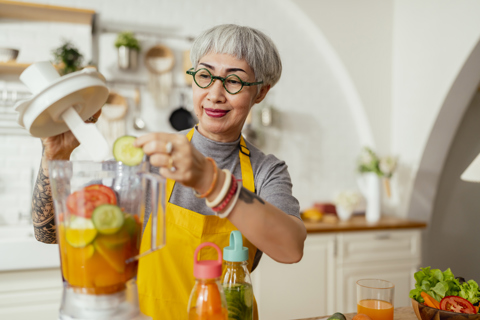 Woman Using Blender