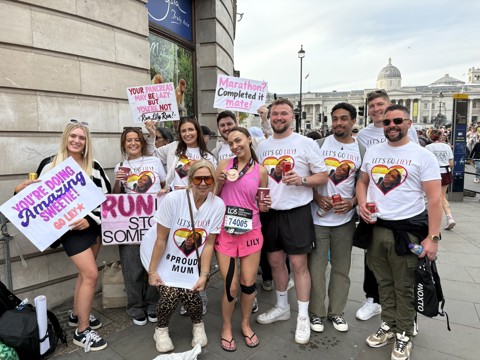 DRWF Runner At London Marathon With Family Finish Line