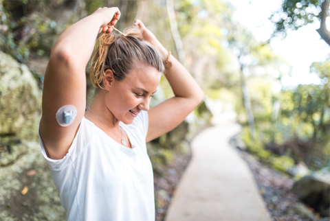Woman With Dexcom CGM On Arm R