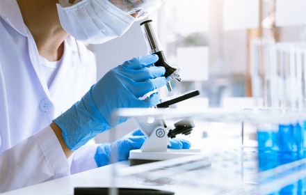 Medical Researcher Microscope R