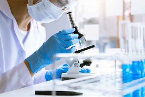 Medical Researcher Microscope R