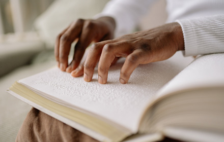 Blind Person Reading Brail
